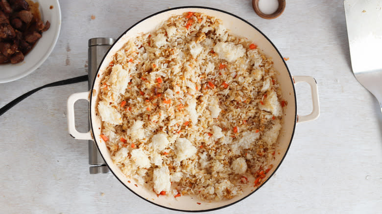 rice and vegetables in a pan