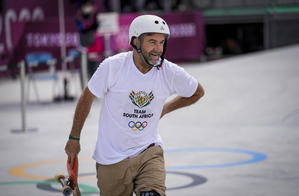 Dallas Oberholzer, 46, from South Africa, takes part in a men's park skateboarding training session at the 2020 Summer Olympics, Saturday, July 31, 2021, in Tokyo, Japan. The age-range of competitors in skateboarding's Olympic debut at the Tokyo Games is remarkably broad and Oberholzer will go wheel-to-wheel with skaters less than half his age. (AP Photo/Ben Curtis)