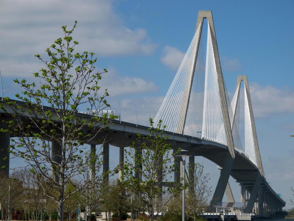 The Arthur Ravenel Bridge linking Mount Pleasant, S.C., and Charleston, S.C., is seen in this March 25, 2013 photograph. The bridge, which cost $632 million to build, has a bike and walking lane on the harbor side that provides stunning views of Charleston, Charleston Harbor and the Atlantic Ocean beyond. (AP Photo/Bruce Smith)