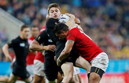 Rugby Union - New Zealand v Tonga - IRB Rugby World Cup 2015 Pool C - St James' Park, Newcastle, England - 9/10/15 New Zealand's Beauden Barrett in action with Tonga's Siale Piutau Action Images via Reuters / Lee Smith