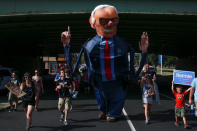 Supporters of U.S. Senator Bernie Sanders carry an effigy with his image as they take part in a protest march ahead of the 2016 Democratic National Convention in Philadelphia, Pennsylvania on July 24, 2016. REUTERS/Adrees Latif