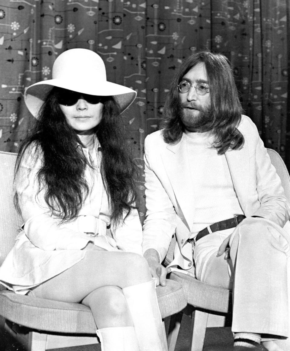 <p>John Lennon met Yoko Ono in 1966, when he was still married to his first wife Cynthia. After his divorce was finalized, Lennon and Ono married in 1969 in a <a href="http://ultimateclassicrock.com/john-lennon-marries-yoko-ono/" rel="nofollow noopener" target="_blank" data-ylk="slk:10-minute ceremony;elm:context_link;itc:0;sec:content-canvas" class="link ">10-minute ceremony</a> at the British Consulate office. They have one child together, Sean Lennon, and remained married until Lennon's death in 1973. </p>