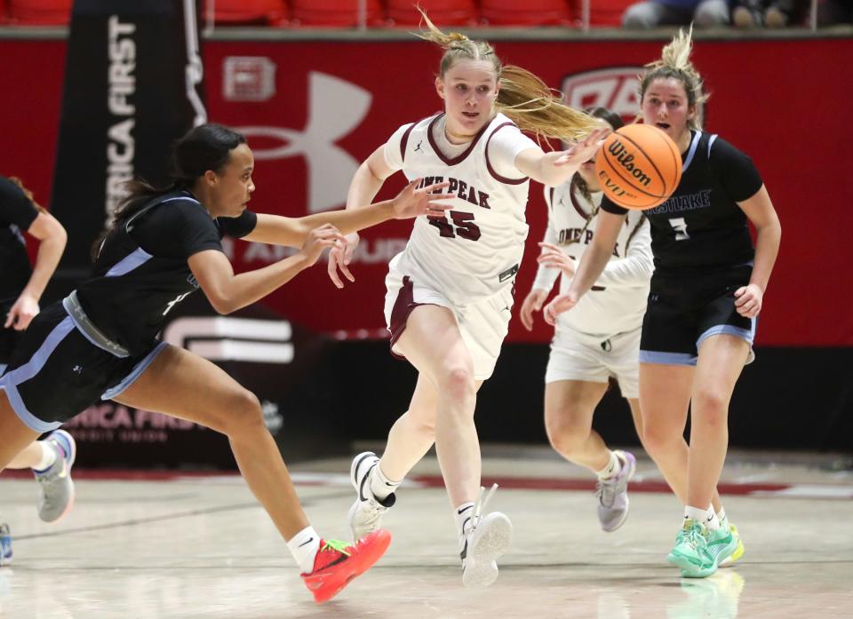 Westlake’s Jada Willis and Lone Peak’s Sarah Bartholomew reach for the ball during a 6A girls quarterfinal basketball game at the Huntsman Center in Salt Lake City on Monday, Feb. 26, 2024. Lone Peak won 59-50. | Kristin Murphy, Deseret News