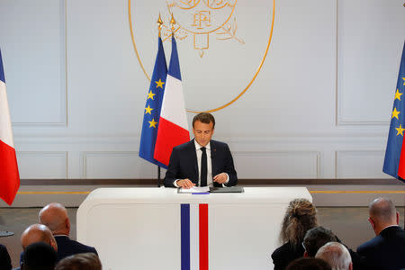 French President Emmanuel Macron speaks during a news conference to unveil his policy response to the yellow vests protest, at the Elysee Palace in Paris, France, April 25, 2019. REUTERS/Philippe Wojazer