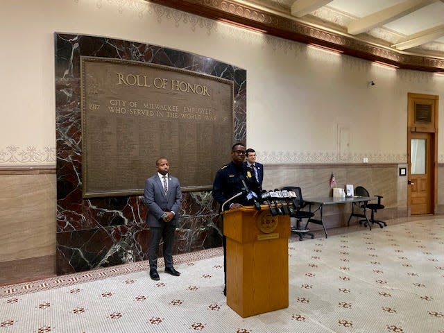 Police Chief Jeffrey Norman, center, with Milwaukee Mayor Cavalier Johnson, left, and Fire and Police Commission Executive Director Leon Todd announce a new initiative to recruit more females to the Milwaukee Police Department. The city pledged that by 2030, the department's recruit classes will be 30% female.