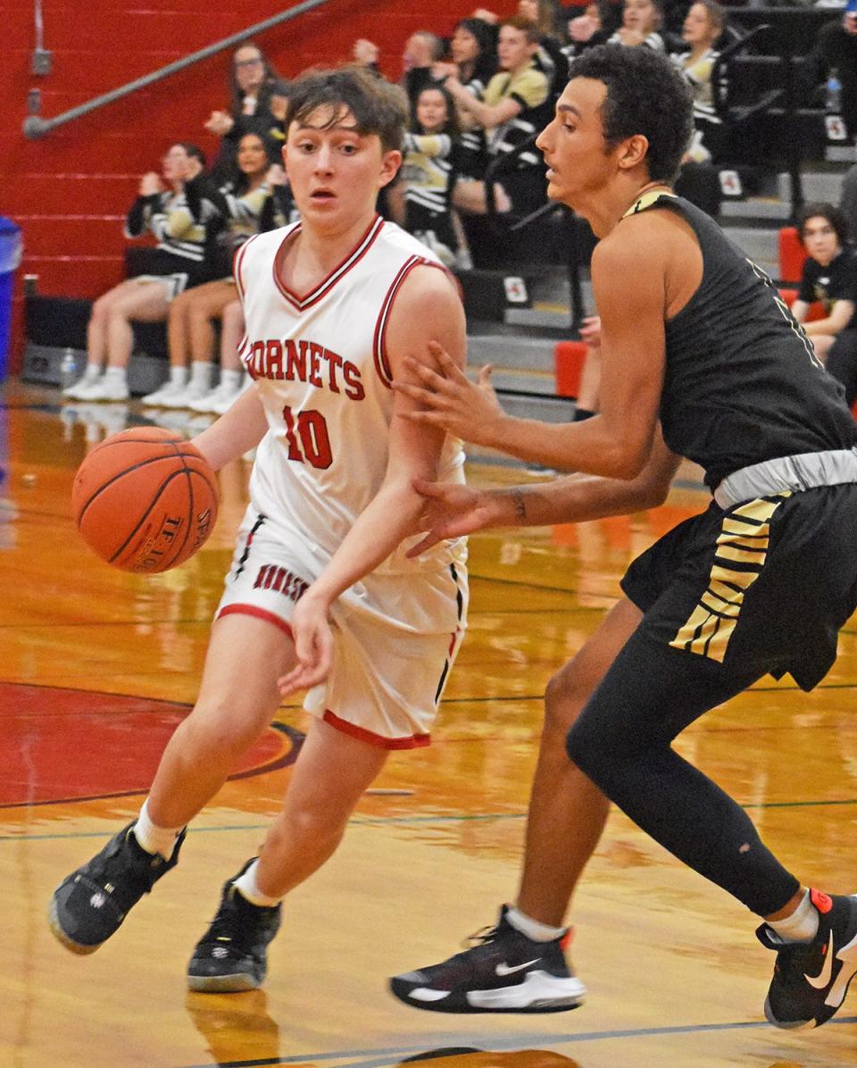 Rylan Montgomery (10) of Honesdale blows by a Western Wayne defender during Wednesday night action at the 62nd Annual Jaycees Holiday Tournament.