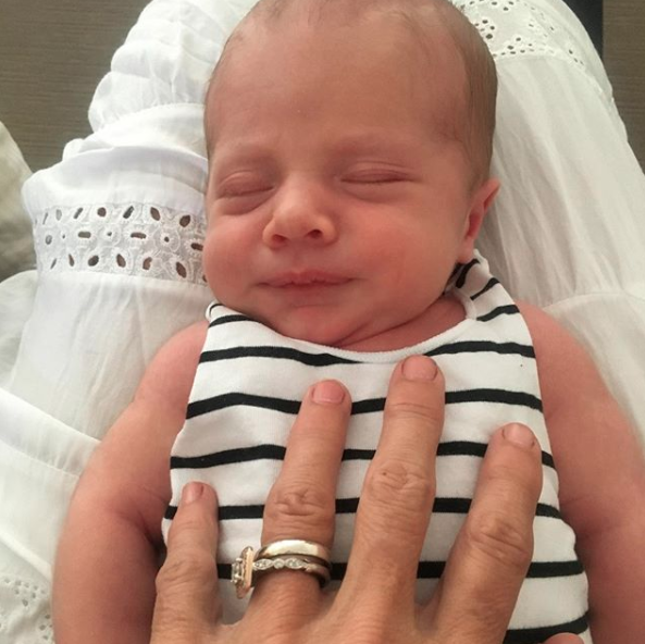 In the second photo, Flynn looks just as blissed out as he napped on his grandma's lap. So cute. Source: Instagram / lisacurry