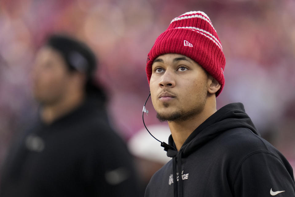 FILE - San Francisco 49ers quarterback Trey Lance watches during the second half of an NFL football game against the Washington Commanders, Saturday, Dec. 24, 2022, in Santa Clara, Calif. Whether it's the Jets giving away three extra second-round picks to move up and take San Darnold third overall in 2018 or the 49ers giving up three first-round picks to draft Trey Lance third overall in 2021 only to have him start four games his first two seasons, there have been many misses.(AP Photo/Godofredo A. Vásquez, File)