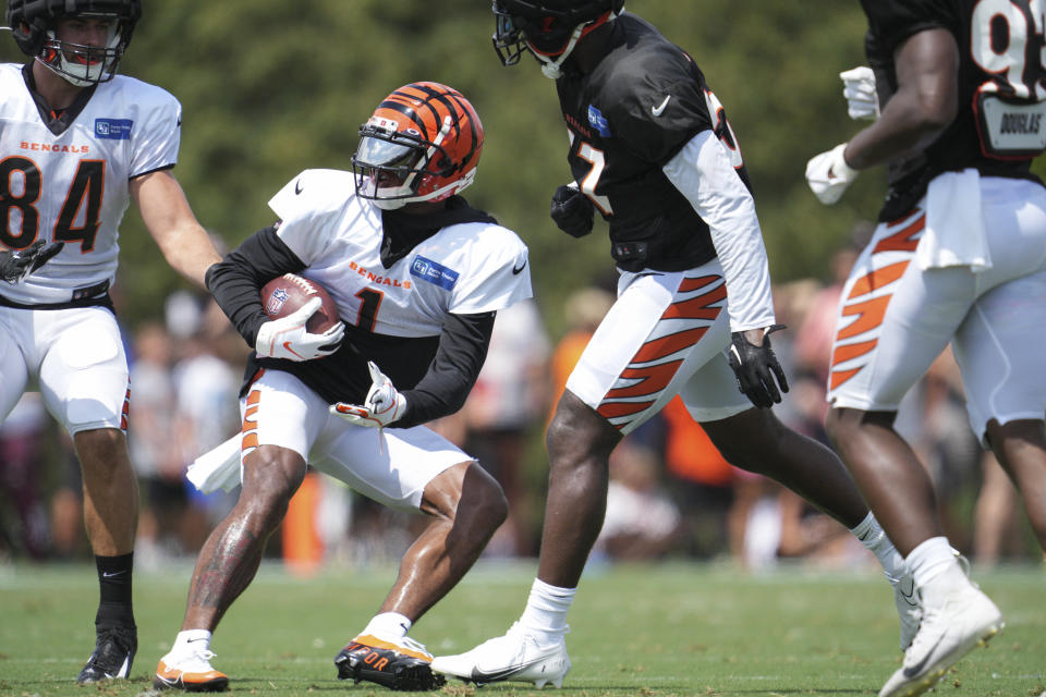 Cincinnati Bengals wide receiver Ja'Marr Chase (1) makes a catch during NFL football training camp Wednesday, Aug. 10, 2022, in Cincinnati. (AP Photo/Jeff Dean)
