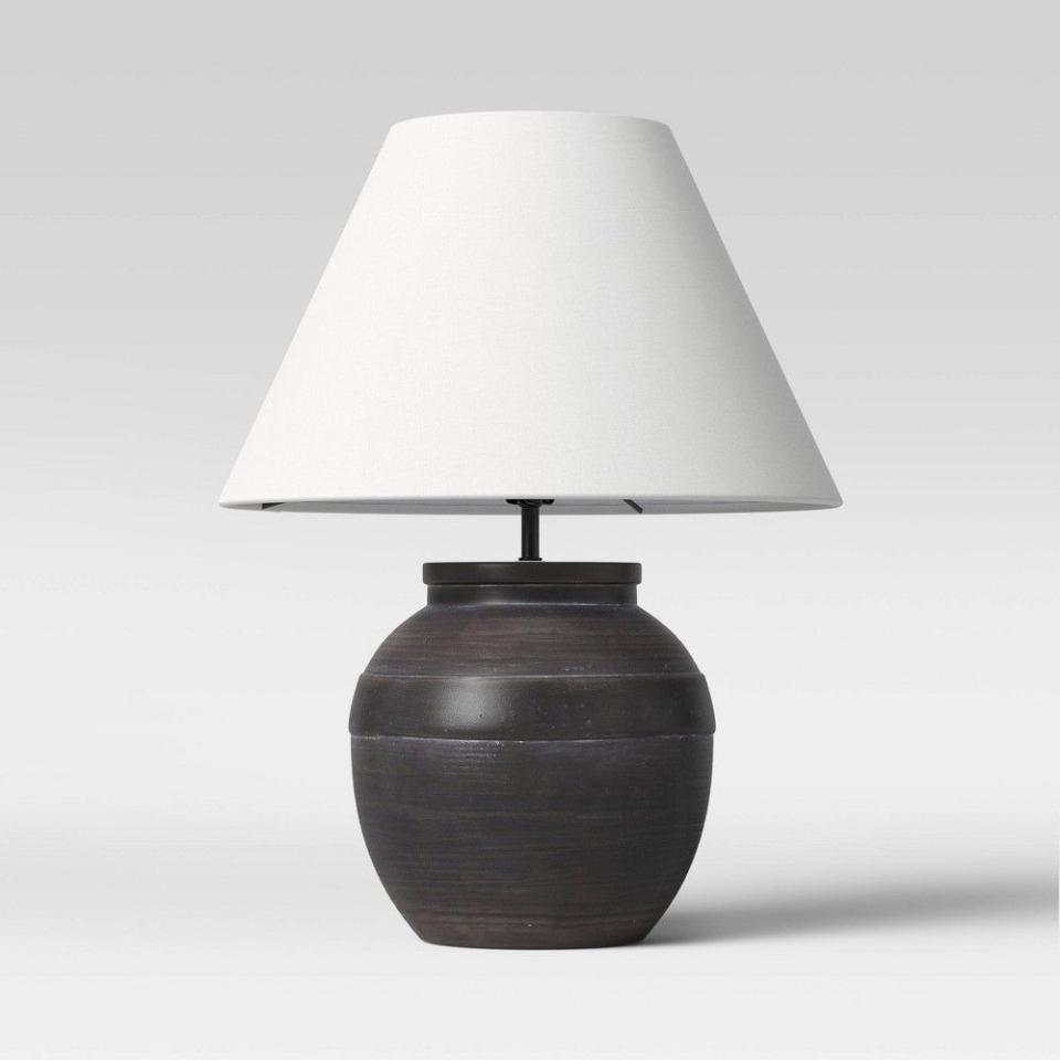 <p><a href="https://go.redirectingat.com?id=74968X1596630&url=https%3A%2F%2Fwww.target.com%2Fp%2Flarge-ceramic-table-lamp-black-threshold-8482%2F-%2FA-82261047&sref=https%3A%2F%2Fwww.housebeautiful.com%2Fshopping%2Fbest-stores%2Fa44689007%2F18-things-designers-always-buy-at-target%2F" rel="nofollow noopener" target="_blank" data-ylk="slk:Shop Now;elm:context_link;itc:0;sec:content-canvas" class="link ">Shop Now</a></p><p>Large Ceramic Table Lamp Black - Threshold™</p><p>target.com</p><p>$70.00</p>