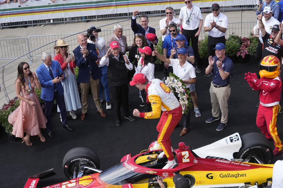 Josef Newgarden celebrates after winning the Indianapolis 500 auto race at Indianapolis Motor Speedway, Sunday, May 28, 2023, in Indianapolis. (AP Photo/Darron Cummings)