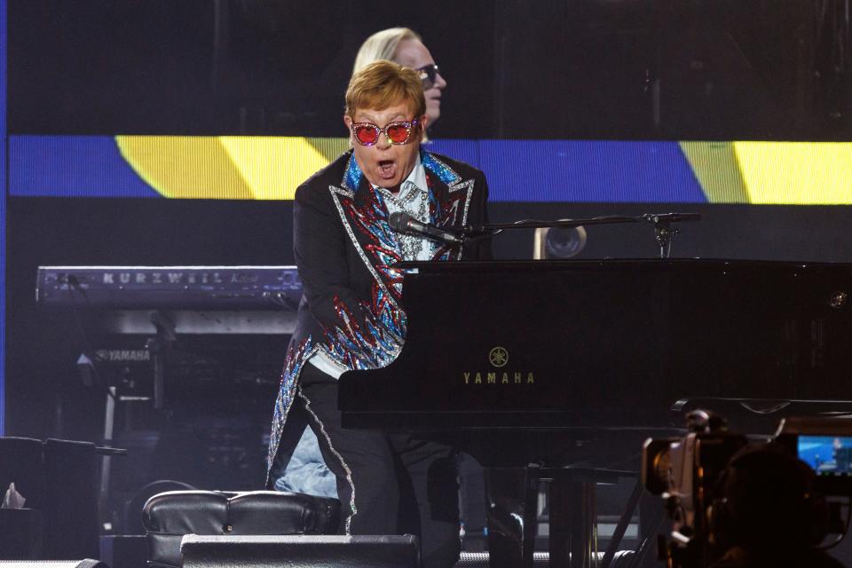 Elton John performs at the final North American show of his "Farewell Yellow Brick Road" tour on Sunday.