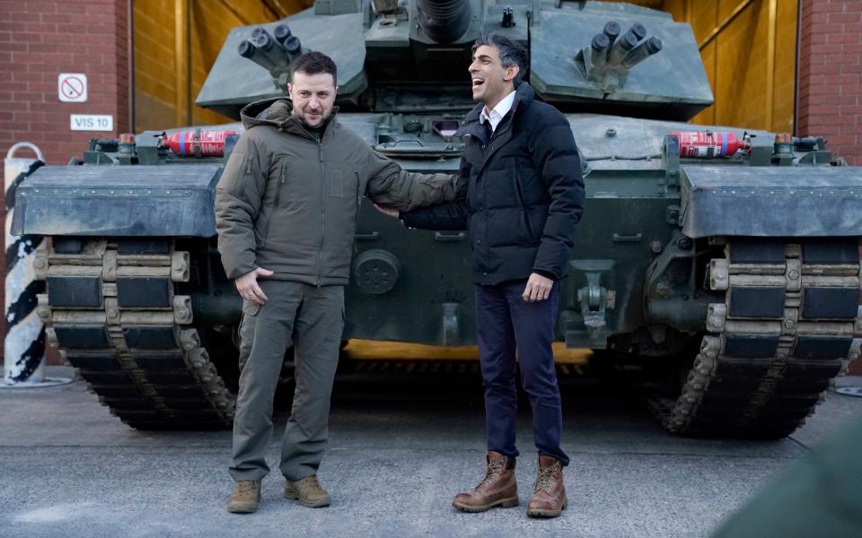 Prime Minister Rishi Sunak and Ukrainian President Volodymyr Zelensky meet Ukrainian troops being trained to command Challenger 2 tanks at a military facility in Lulworth, Dorset - Andrew Matthews/PA Wire