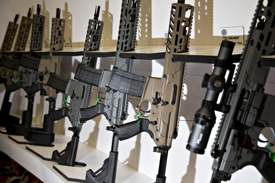 A rack of Sig Sauer rifles at the company's booth during the National Rifle Association annual meeting in Dallas, May 5. (Photo: Bloomberg via Getty Images)