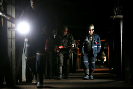 Miners enter the Mindeli coal mine in Tkibuli, Georgia, July 13, 2018. REUTERS/David Mdzinarishvili