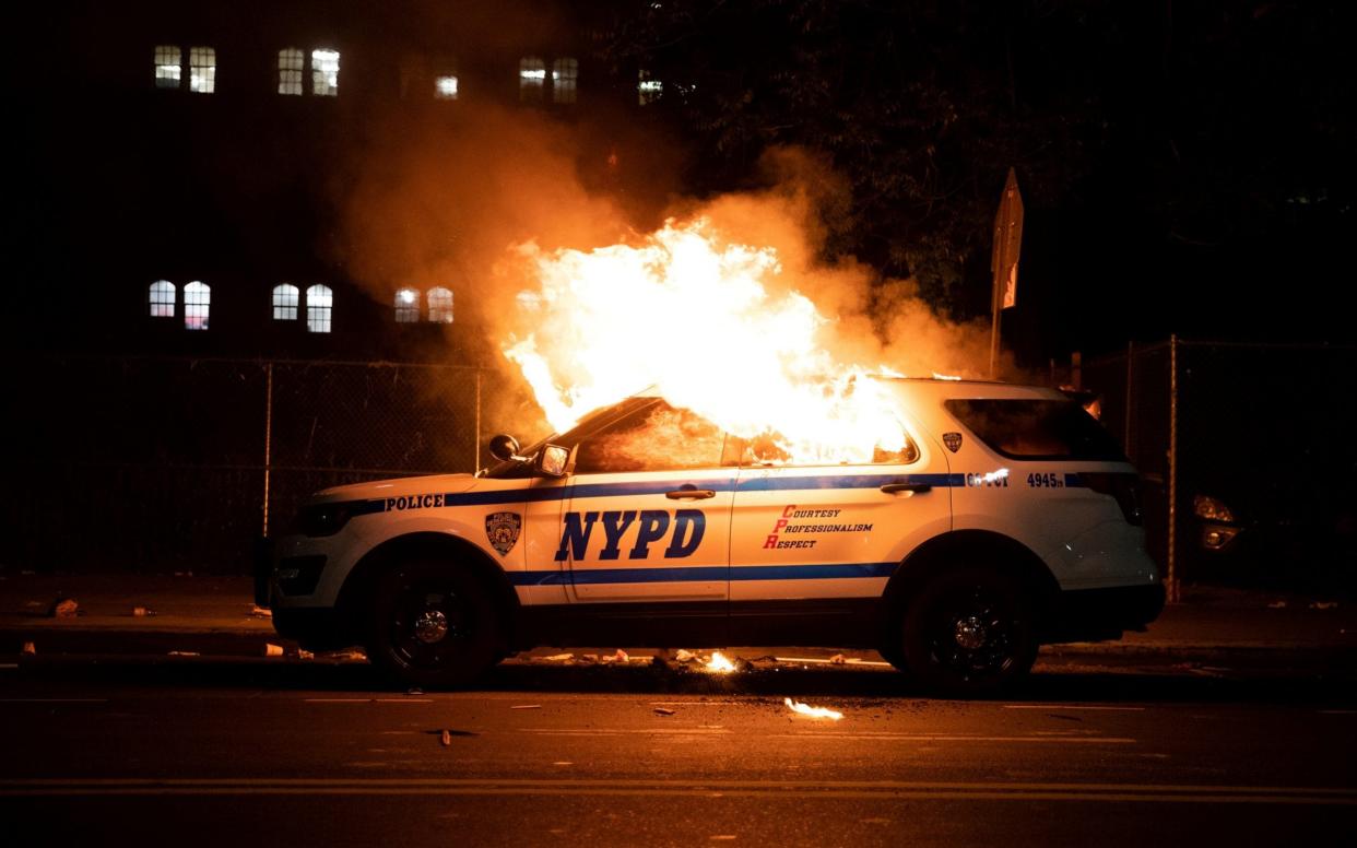 Protesters in New York rally against the death in Minneapolis police custody of George Floyd - Jeenah Moon/Reuters