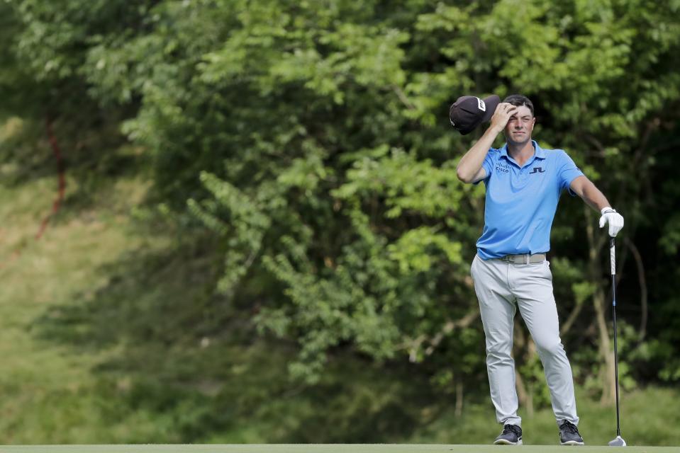 Viktor Hovland, of Norway, reacts after his shot on the 15th hole during the third round of the Workday Charity Open golf tournament, Saturday, July 11, 2020, in Dublin, Ohio. (AP Photo/Darron Cummings)