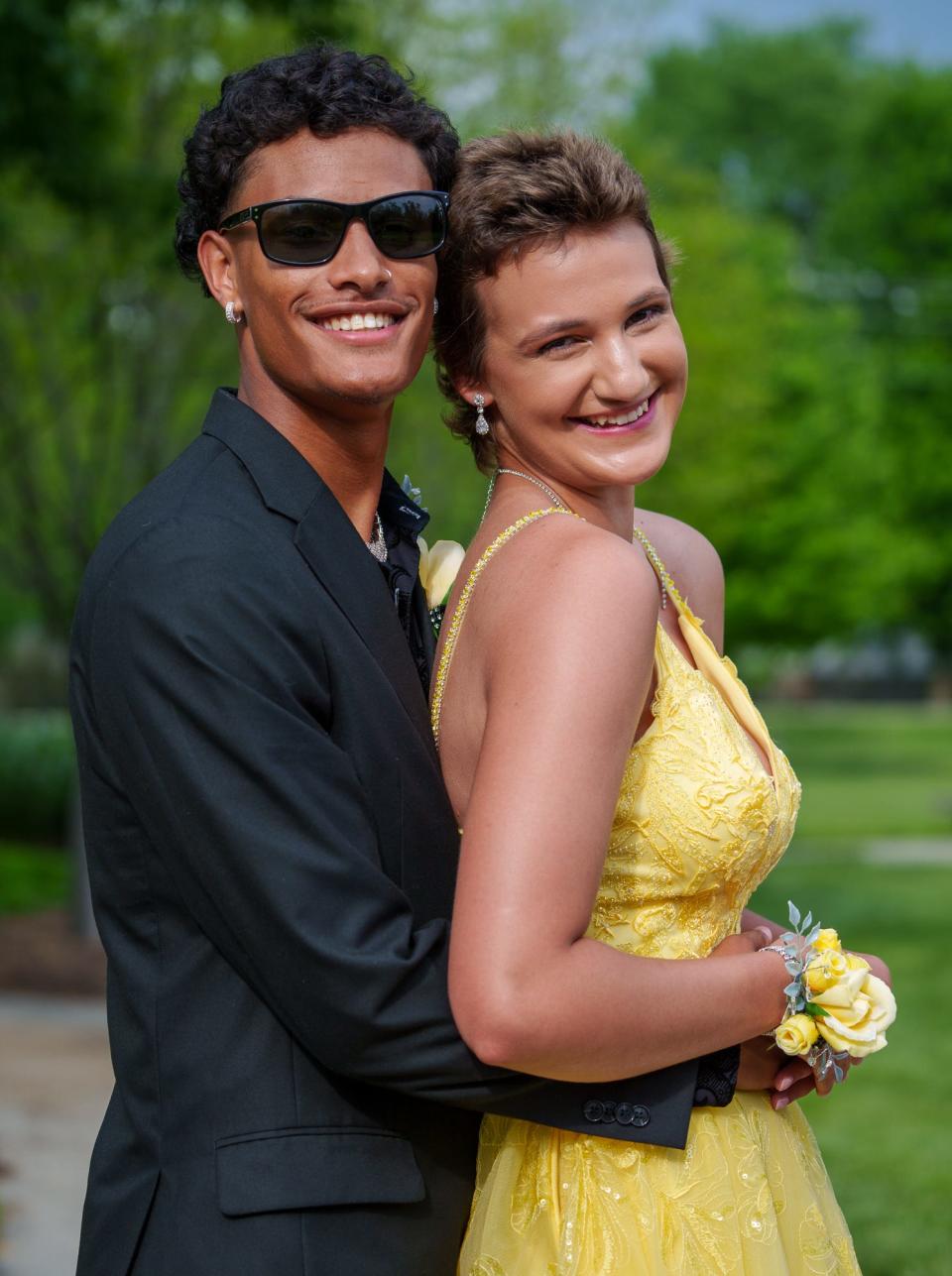 Cade Thompson and Vivian Eagle pose Saturday, May 13, 2023, for prom pictures at Friendship Gardens Park in Plainfield, ahead of Avon's prom.