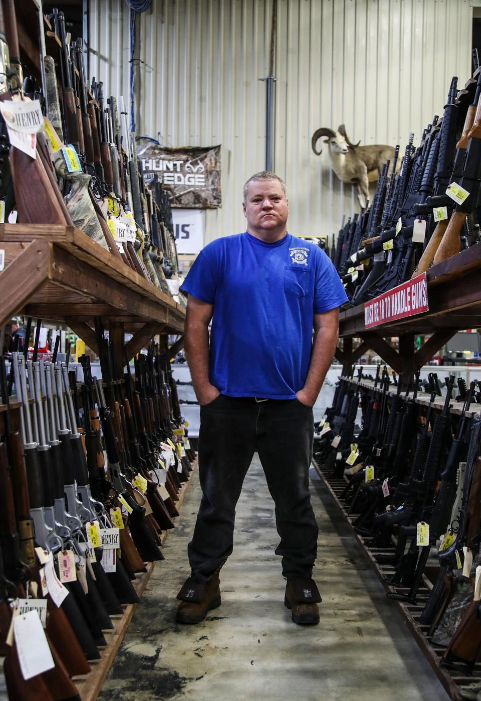 John Cartwright of Kentucky United cannot legally possess a gun because of a past felony conviction. In 2012, he pleaded guilty to multiple counts of defrauding a secured creditor, court records show. “I can’t own a gun … but it doesn’t mean I don’t believe in something,” he said. “I can fight for other people’s freedoms whether I have them or not.” He visited Kentucky Gun Co. in Bardstown. 