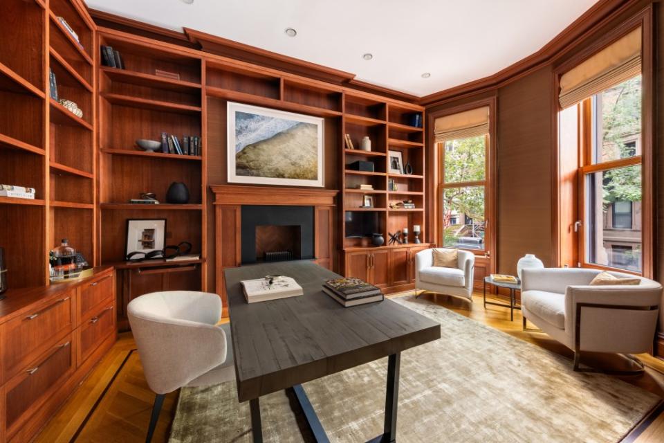 A home office in the seven-story house comes with plenty of built-ins. Evan Joseph