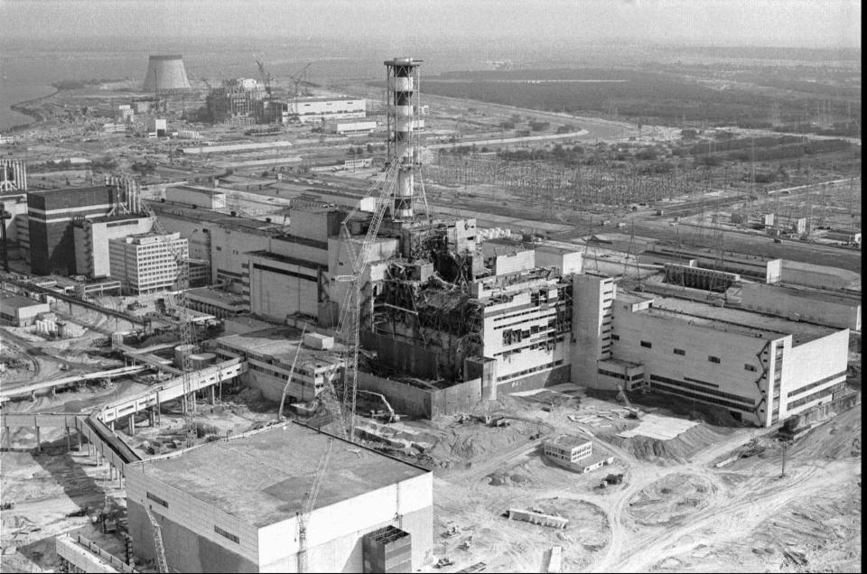 FILE - This photo shows an aerial view of the Chernobyl nuclear plant in Chernobyl showing damage from an explosion and fire in reactor four on April 26, 1986 that sent large amounts of radioactive material into the atmosphere in Ukraine. Gorbachev's esteem in the West was undermined when a reactor at the Chernobyl nuclear power plant exploded in 1986, spewing a cloud of radioactive fallout over much of Europe for a week before the fire could be put out. Despite Gorbachev's advocacy of glasnost, the Soviets did not inform the outside world of the disaster for two days. (AP Photo/Volodymyr Repik, File)