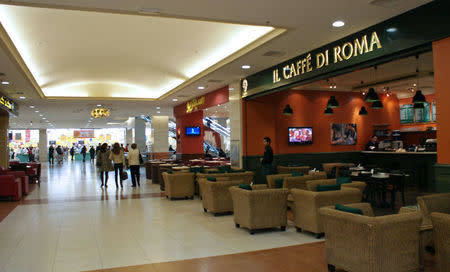 People walk inside the Shahba Mall in Aleppo, Syria December 12, 2009. REUTERS/Khalil Ashawi