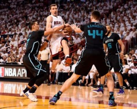 May 1, 2016; Miami, FL, USA; Miami Heat guard Goran Dragic (7) is fouled by Charlotte Hornets guard Jeremy Lin (7) during the second half in game seven of the first round of the NBA Playoffs at American Airlines Arena. Mandatory Credit: Steve Mitchell-USA TODAY Sports