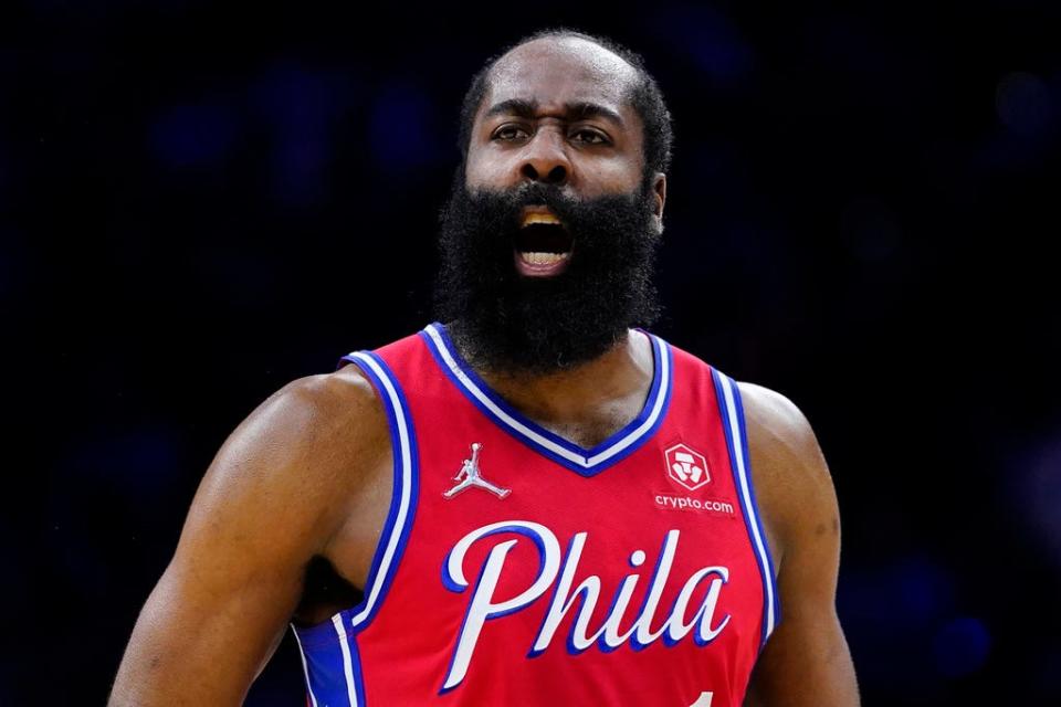 FILE - Philadelphia 76ers' James Harden reacts during Game 2 of an NBA basketball first-round playoff series, Monday, April 18, 2022, in Philadelphia. Harden appears determined to sever ties with the Philadelphia 76ers after the star guard called team president Daryl Morey a liar at a promotional event at China. Harden’s comments, video of which surfaced Monday, Aug. 14, 2023, came almost seven weeks after he picked up his $35.6 million option with the 76ers for this season and then promptly said he wanted to be traded.(AP Photo/Matt Slocum, File)