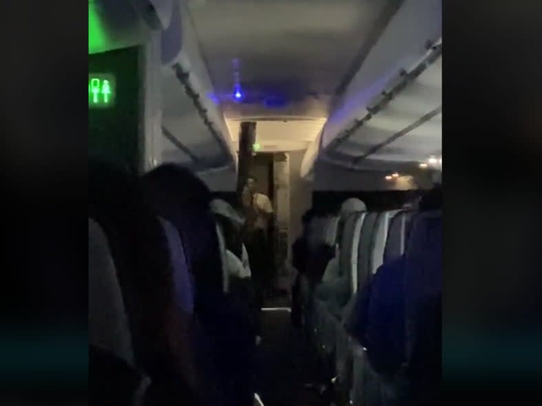 Video of a 7 June flight in which passengers insulted staff (Brent Underwood/TikTok)