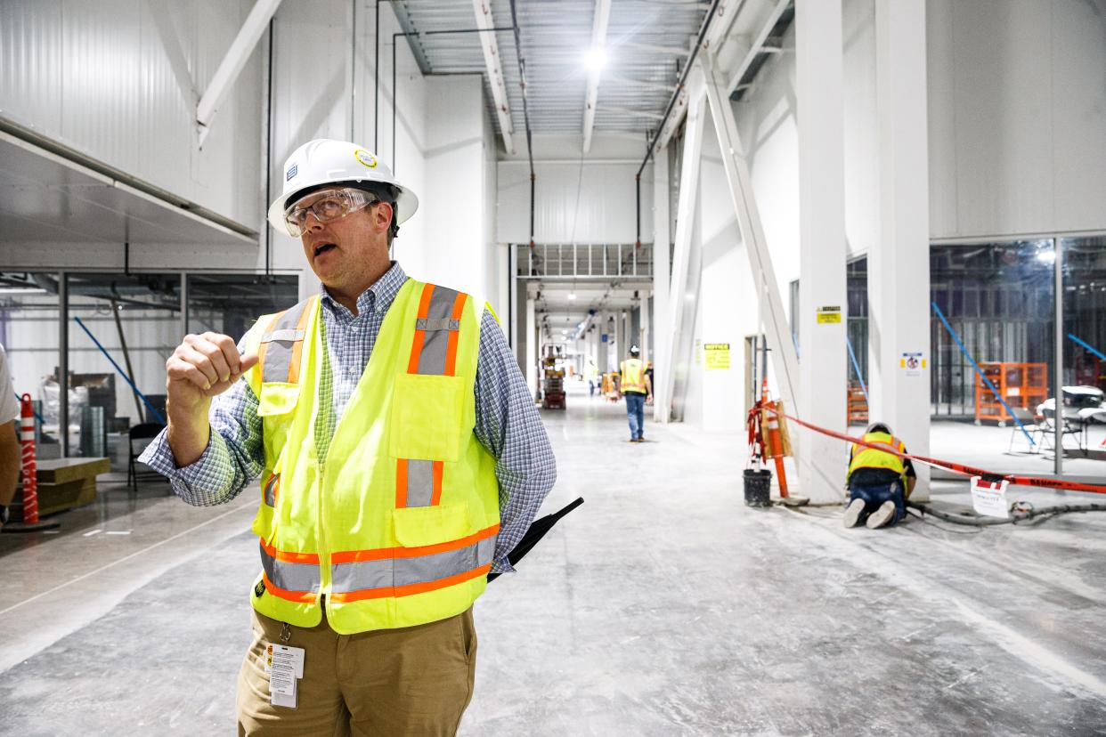 Chris Desaultes, Ultium Cells plant manager, speaks about the plants hallway system and timetables for construction in Spring Hill, Tenn. on Thursday, Aug. 3, 2023.