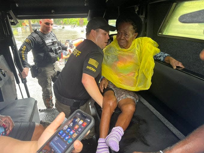 Orange County Sheriff's deputies rescue woman in flooded Orlo Vista neighborhood. Source: Orange County Sheriff's Office.