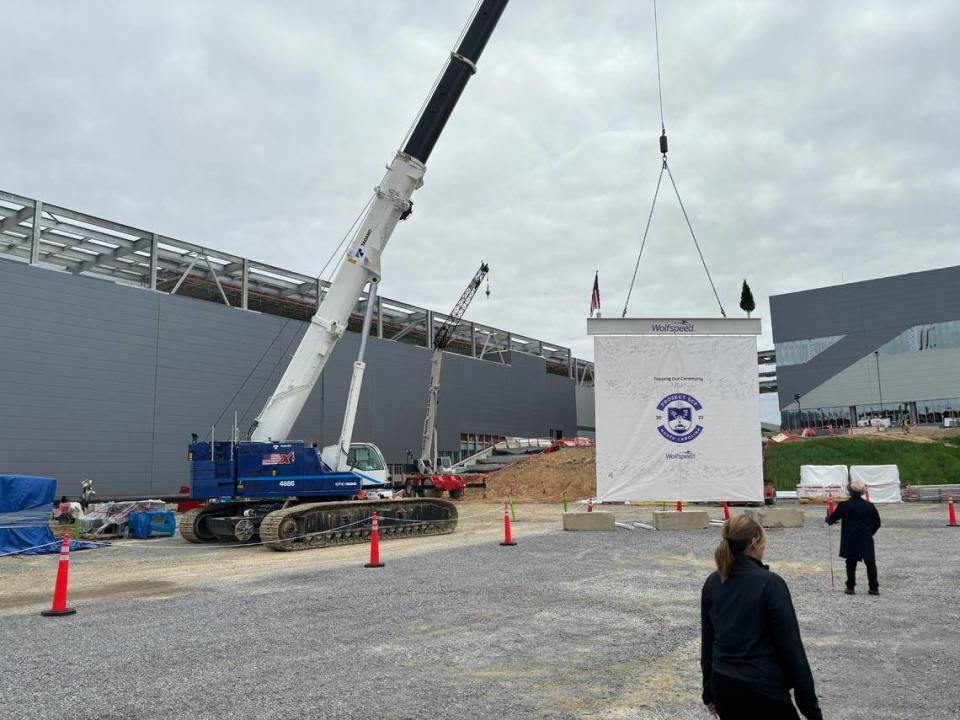 Wolfspeed raised a ceremonial final beam on March 26, 2024 at its future facility in Siler City, North Carolina.