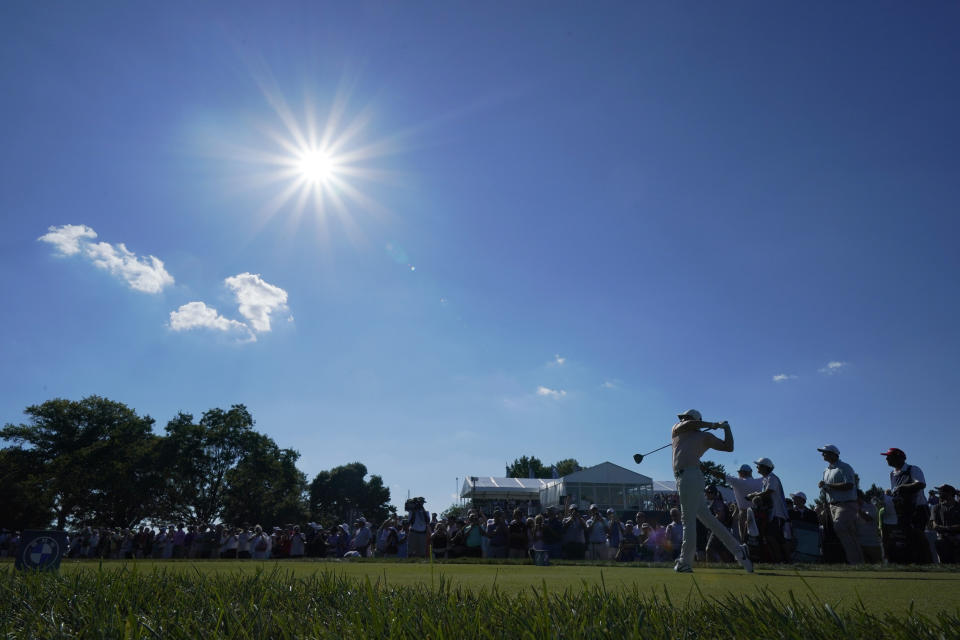 Rory McIlroy, of Northern Ireland, watches his shot on the 11th tee during the first round of the BMW Championship golf tournament at Wilmington Country Club, Thursday, Aug. 18, 2022, in Wilmington, Del. (AP Photo/Julio Cortez)