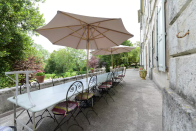 <p>The patio is perfect place to take in the French countryside and the castle grounds. (Airbnb) </p>