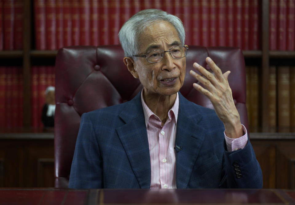 Pro-democracy lawyer Martin Lee gestures during an interview in Hong Kong, Friday, June 19, 2020. Lee said Friday that Beijing was trying to wrest control of Hong Kong with the impending national security law, and urged people to protest peacefully without violence. (AP Photo/Vincent Yu)