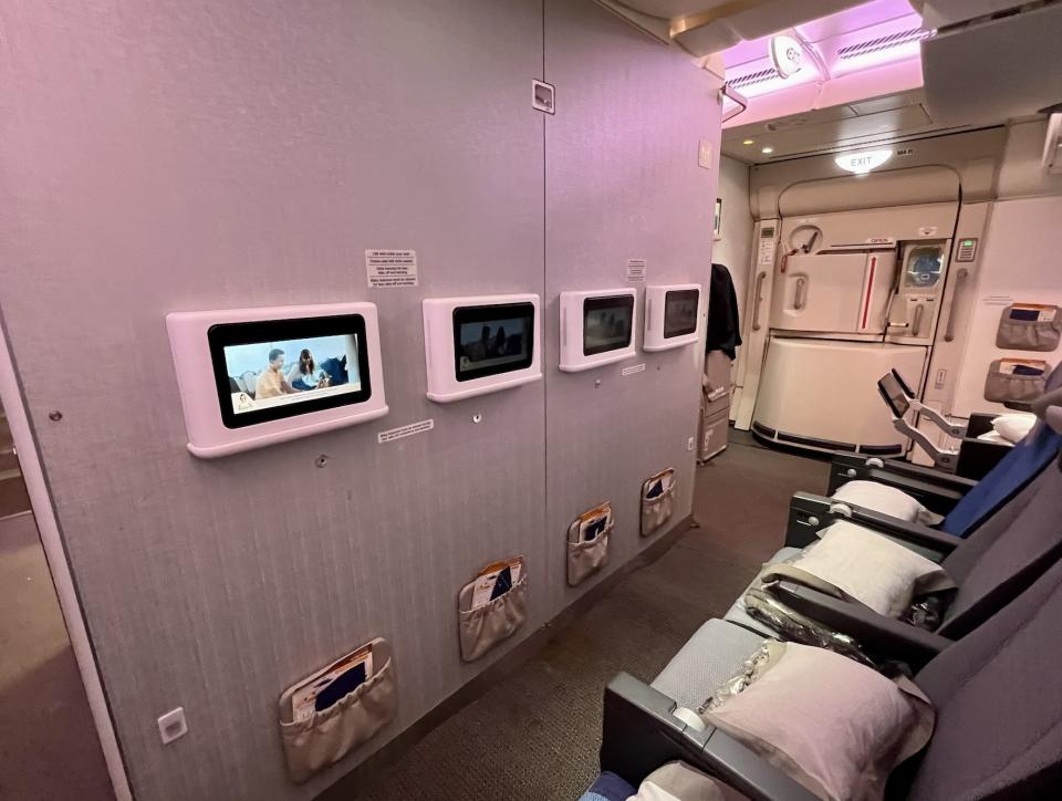 A view of the screens on the bulkhead in Singapore's A380 economy class.