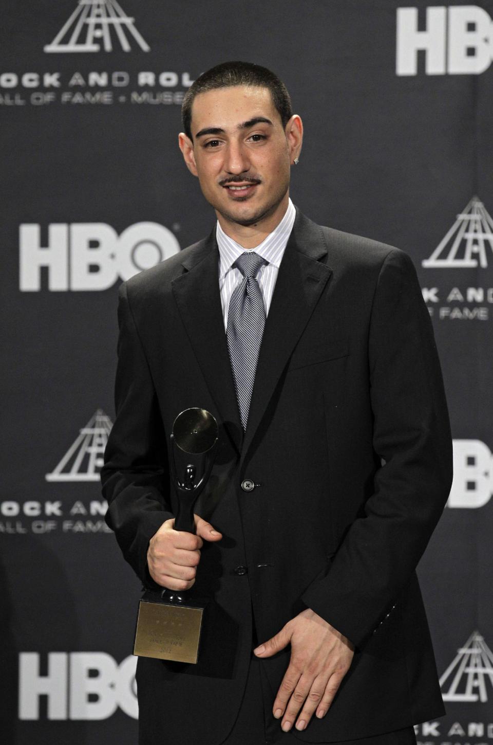 Gil Bianchini appears in the press room after accepting induction into the Rock and Roll Hall of Fame for his late mother, Laura Nyro, Friday, April 13, 2012, in Cleveland. (AP Photo/Amy Sancetta)