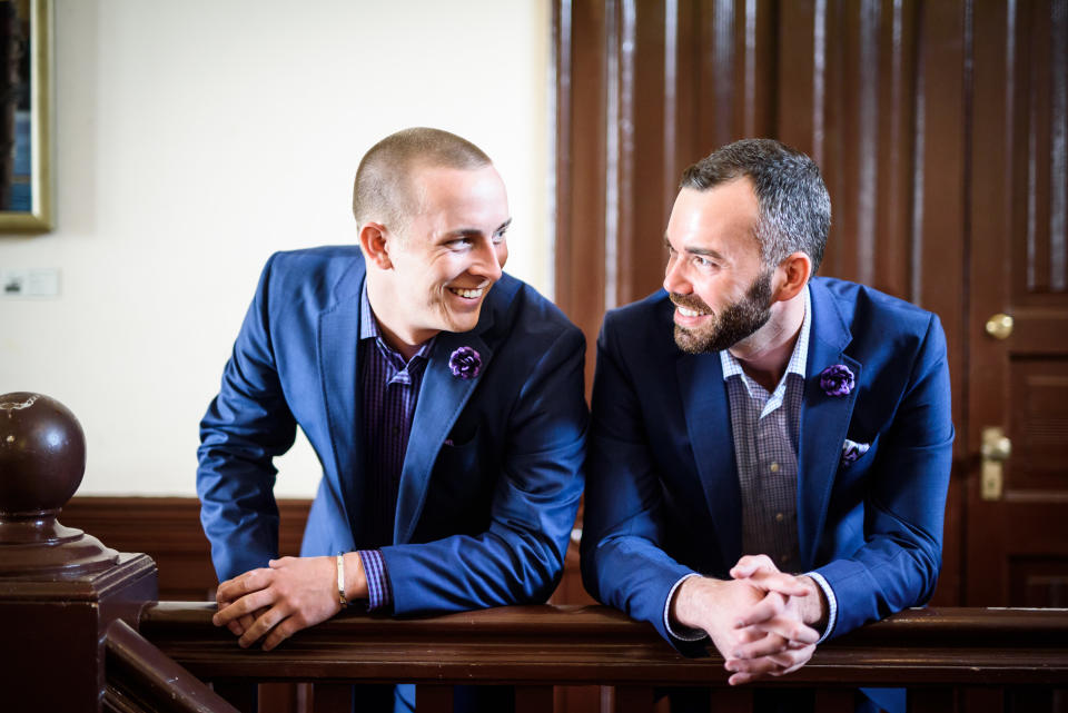 The dapper duo in blue. (Photo: <a href="http://www.nolaweddingphotographer.com/" target="_blank">Michael Caswell</a>)