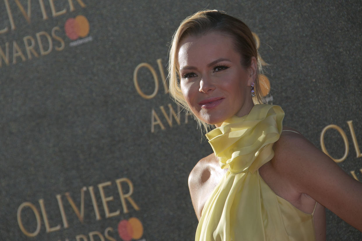 Amanda Holden poses for photographers as she arrives for the Olivier Awards at the Royal Albert Hall in central London, Sunday, April 9, 2017. (Photo by Joel Ryan/Invision/AP)