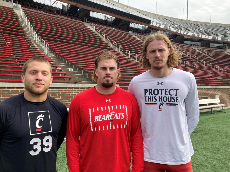 Part of UC's special teams unit is (from left) holder Bryce Burton, long snapper Cayson Pfeiffer and punter Mason Fletcher.