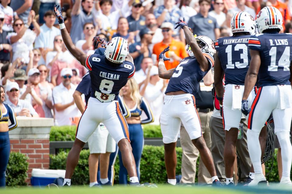 Wide receiver KeAndre Lambert-Smith #5 of the Auburn Tigers celebrates with wide receiver Cam Coleman #8 of the Auburn Tigers after scoring a touchdown during the first half of their game against the California Golden Bears at Jordan-Hare Stadium on Sept. 7, 2024 in Auburn, Alabama. Michael Chang/Getty Images