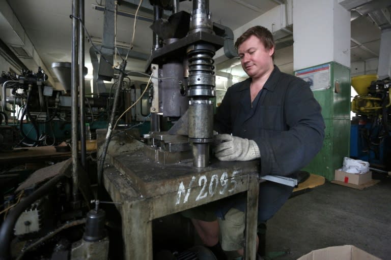 A partially sighted worker at a factory in the rebel-held Ukrainian city of Donetsk