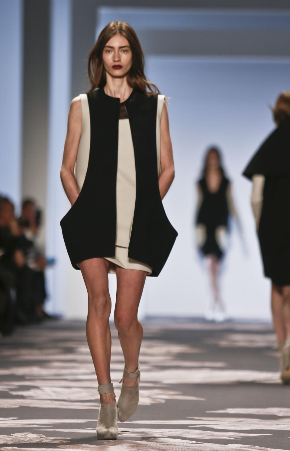 Fashion from the Fall 2013 Vera Wang collection is modeled on Tuesday, Feb. 12, 2013 in New York. (AP Photo/Bebeto Matthews)