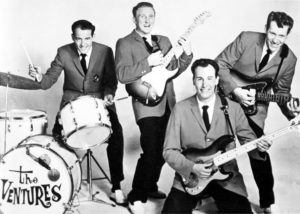 Drummer Howie Johnson, guitarist Don Wilson, bassist Nokie Edwards and guitarist Bob Bogle of the rock and roll band "The Ventures" pose for a portrait in 1960.