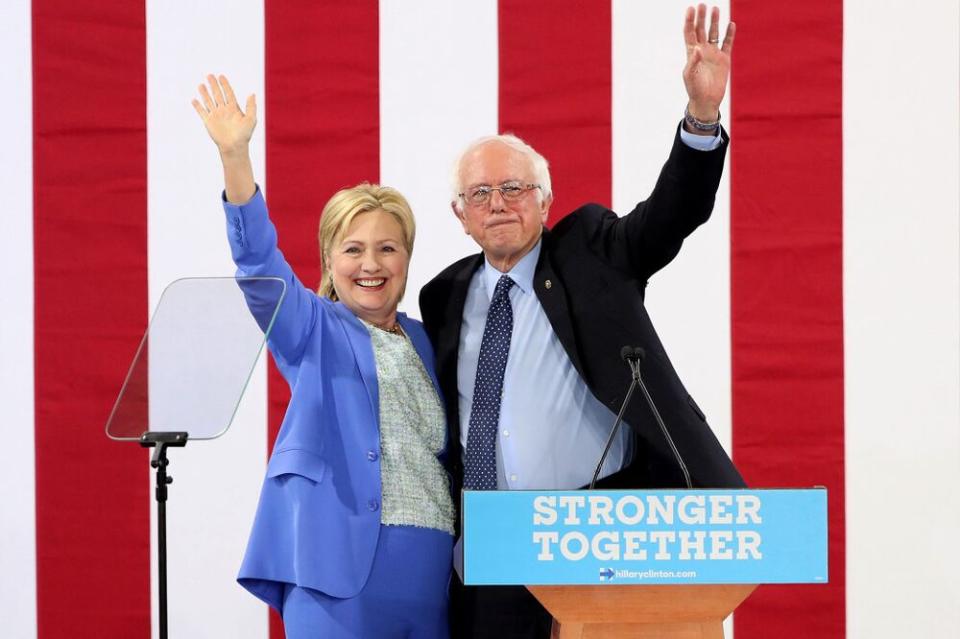 From left: former presidential nominee and Secretary of State Hillary Clinton with Sen. Bernie Sanders, who endorsed her in 2016 | Taylor Hill/WireImage