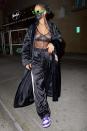 <p>Rihanna steps out in a silk robe on her way to dinner at Wally's in Beverly Hills late Monday night.</p>