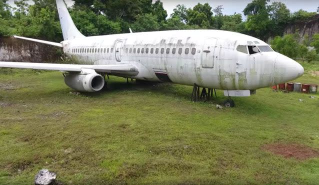 No one knows how this plane got into a field in Bali or what it's doing there. Source: YouTube/ ExploringWithJosh