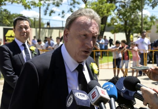 Cardiff City manager Neil Warnock talks to the press as Cardiff's chief executive Ken Choo watches during the wake for Argentine footballer Emiliano Sala in Progreso, Argentina