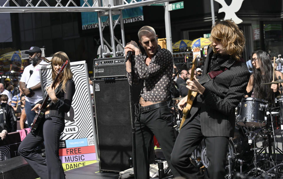 Victoria De Angelis, left, Damiano David, Thomas Raggi and Ethan Torchio from the Italian rock band Måneskin perform in Times Square on Friday, Sept. 15, 2023, in New York. (Photo by Evan Agostini/Invision/AP)