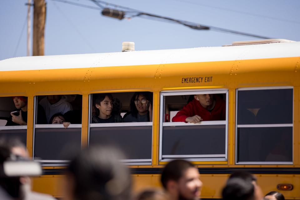 A student on a Mountain View High School bus talked to a loved one after a threat in the Clint ISD area on Friday, April 26. The students were being bused to a reunion site with their parents.